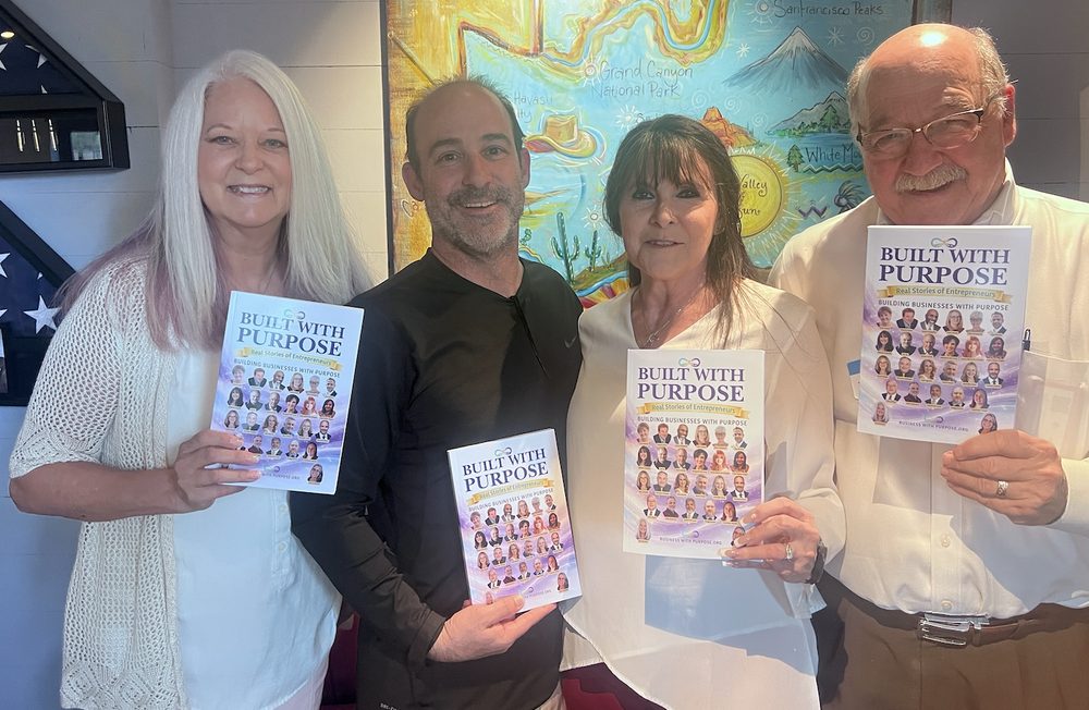 Group of BWP authors with their books